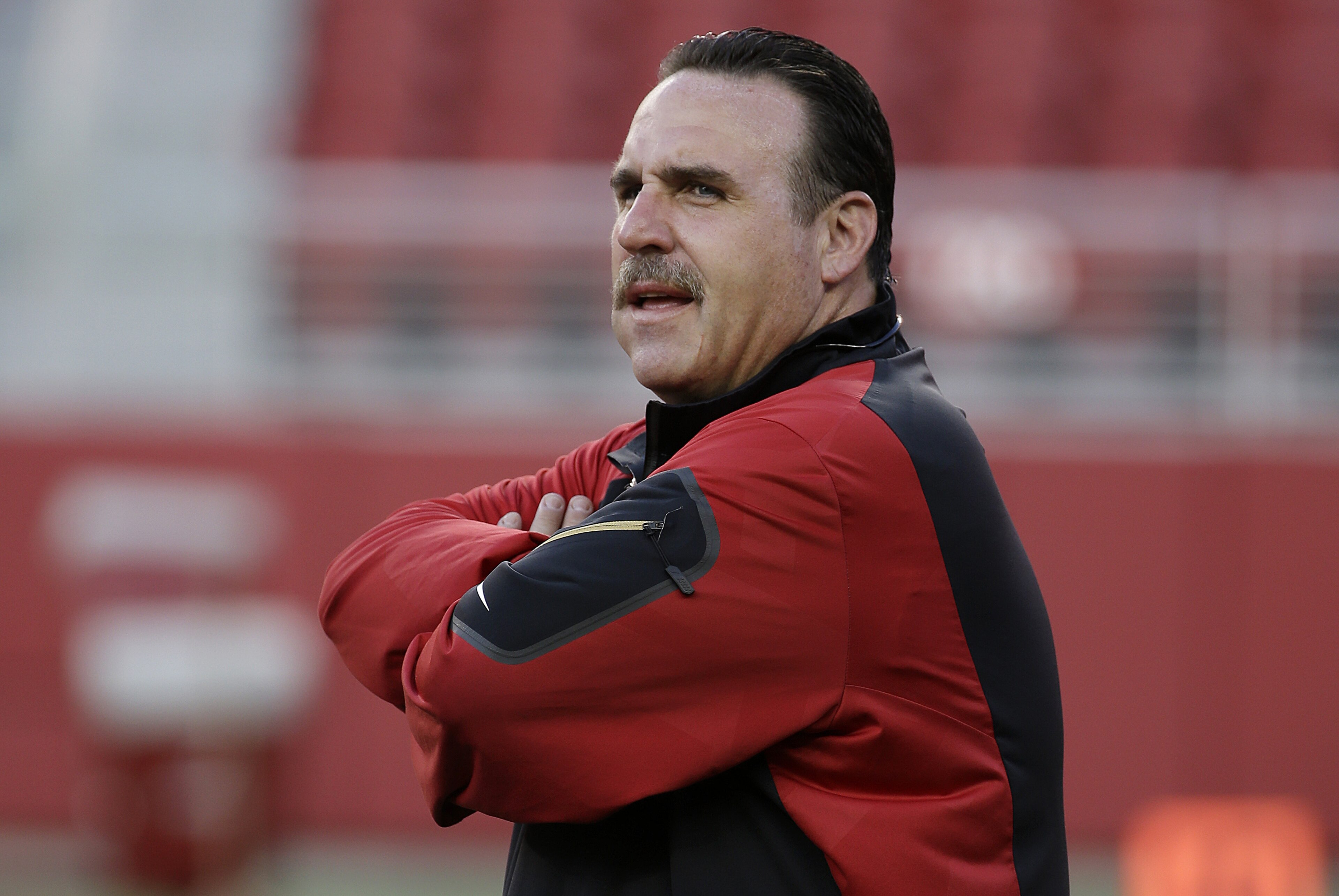 San Francisco 49ers head coach Jim Tomsula watches players during the team's NFL football training camp in Santa Clara, Calif., Saturday, Aug. 1, 2015. (AP Photo/Jeff Chiu) San Francisco 49ers head coach Jim Tomsula watches players during the team's NFL football training camp in Santa Clara, Calif., Saturday, Aug. 1, 2015. (AP Photo/Jeff Chiu)