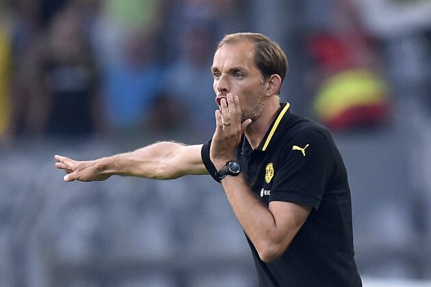 Dortmund's new head coach Thomas Tuchel reacts during the Europa League qualifying soccer match between Borussia Dortmund and Wolfsberger AC in Dortmund, Germany, Thursday, Aug. 6, 2015. (AP Photo/Martin Meissner)