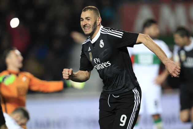Real Madrid's Karim Benzema, from France, celebrates after scoring against Elche during a Spanish La Liga soccer match at the Manuel Martinez Valero stadium in Elche, Spain, on Sunday, Feb. 22, 2015. (AP Photo/Alberto Saiz) Real Madrid's Karim Benzema, from France, celebrates after scoring against Elche during a Spanish La Liga soccer match at the Manuel Martinez Valero stadium in Elche, Spain, on Sunday, Feb. 22, 2015. (AP Photo/Alberto Saiz)