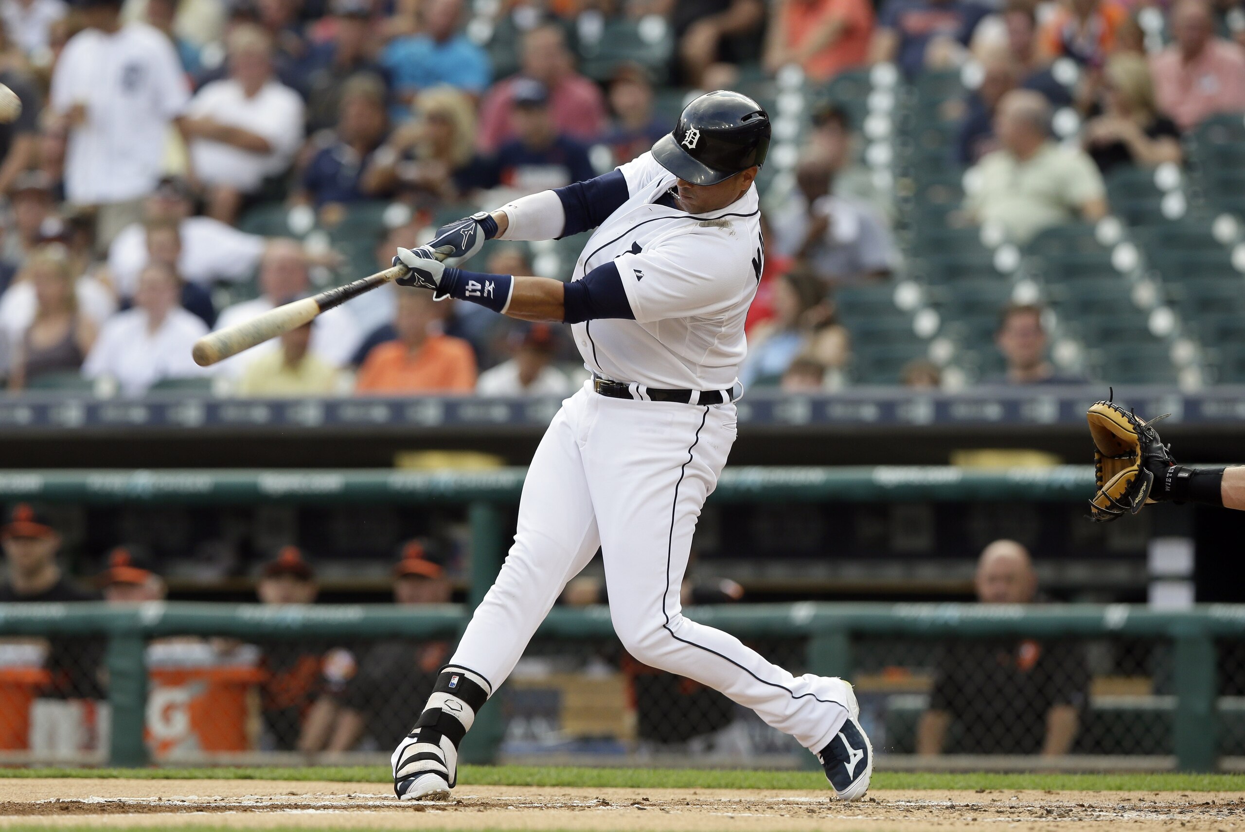 Detroit Tigers designated hitter Victor Martinez connects for a two-run home run during the first inning of a baseball game against the Baltimore Orioles, Friday, July 17, 2015, in Detroit. (AP Photo/Carlos Osorio)