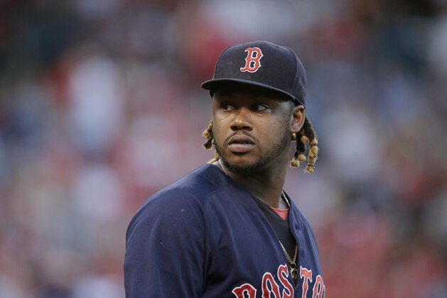Boston Red Sox's Hanley Ramirez walks onto the field in the third inning of the second baseball game in a doubleheader against the Los Angeles Angels, Monday, July 20, 2015, in Anaheim, Calif. (AP Photo/Jae C. Hong)
