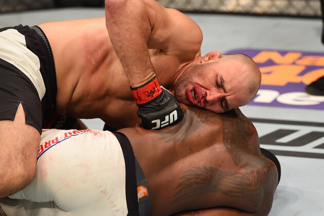 NASHVILLE, TN - AUGUST 08:  (L-R) Glover Teixeira of Brazil punches Ovince Saint Preux in their light heavyweight bout during the UFC Fight Night event at Bridgestone Arena on August 8, 2015 in Nashville, Tennessee.  (Photo by Josh Hedges/Zuffa LLC/Zuffa LLC via Getty Images)