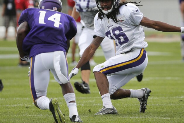 Minnesota Vikings rookie cornerback Trae Waynes closes in on Stefon Diggs (14) during punt coverage practice at an NFL football training camp on the campus of Minnesota State University Tuesday, July 28, 2015, in Mankato, Minn. (AP Photo/Charles Rex Arbogast)