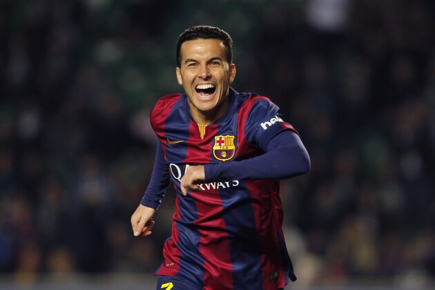 Barcelona's Pedro Rodriguez, celebrates after scoring  during a Spanish La Liga soccer match between Elche and Barcelona, at the Martinez Valero stadium in Elche, Spain, Saturday, Jan. 24, 2015. Barcelona won the match 6-0. (AP Photo/Fernando Bustamante)