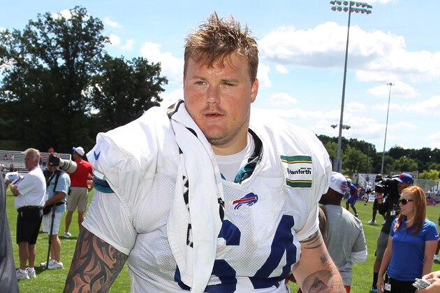 Buffalo Bills guard Richie Incognito (64) walks from the field at the teams NFL football training camp in Pittsford, N.Y., Sunday, Aug. 2, 2015. (AP Photo/Bill Wippert)