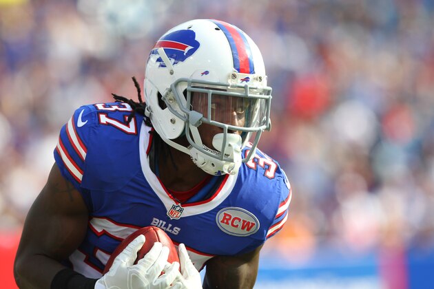 Buffalo Bills Nickell Robey (37) returns a punt during the first half of a preseason NFL football game against the Tampa Bay Buccaneers Saturday, Aug. 23, 2014, in Orchard Park, N.Y. (AP Photo/Bill Wippert)