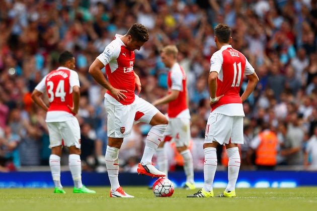 LONDON, ENGLAND - AUGUST 09:  Olivier Giroud and Mesut Oezil of Arsenal react after they conceded a second goal during the Barclays Premier League match between Arsenal and West Ham United at the Emirates Stadium on August 9, 2015 in London, England.  (Photo by Julian Finney/Getty Images)