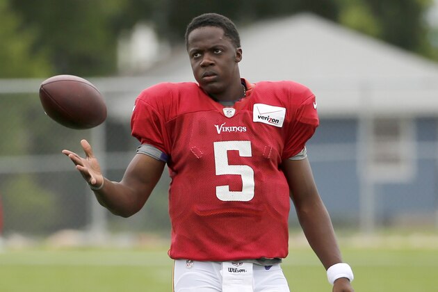 Minnesota Vikings quarterback Teddy Bridgewater warms up before practice at an NFL football training camp on the campus of Minnesota State University Tuesday, July 28, 2015, in Mankato, Minn. (AP Photo/Charles Rex Arbogast)