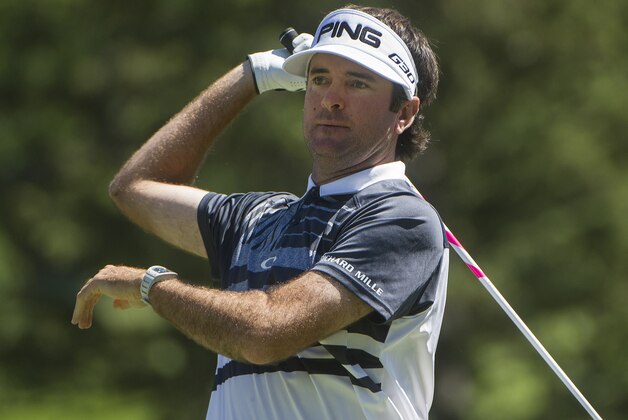 Bubba Watson watches his drive on the third hole during the second round of the Bridgestone Invitational golf tournament in Akron, Ohio, Friday, Aug. 7, 2015. (AP Photo/Phil Long)