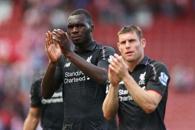 STOKE ON TRENT, ENGLAND - AUGUST 09:  Christian Benteke and James Milner of Liverpool applaud the crowd after the Barclays Premier League match between Stoke City and Liverpool at Brittania Stadium on August 9, 2015 in Stoke on Trent, England.  (Photo by Clive Brunskill/Getty Images)