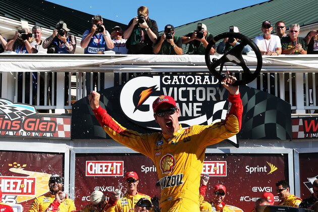 WATKINS GLEN, NY - AUGUST 09:  Joey Logano, driver of the #22 Shell Pennzoil Ford, celebrates in victory lane after winning the NASCAR Sprint Cup Series Cheez-It 355 at the Glen at Watkins Glen International on August 9, 2015 in Watkins Glen, New York.  (Photo by Todd Warshaw/Getty Images)