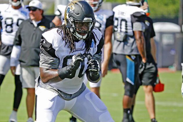 Jacksonville Jaguars offensive guard A.J. Cann during practice at NFL football training camp, Thursday, Aug. 6, 2015, in Jacksonville, Fla. (AP Photo/John Raoux)