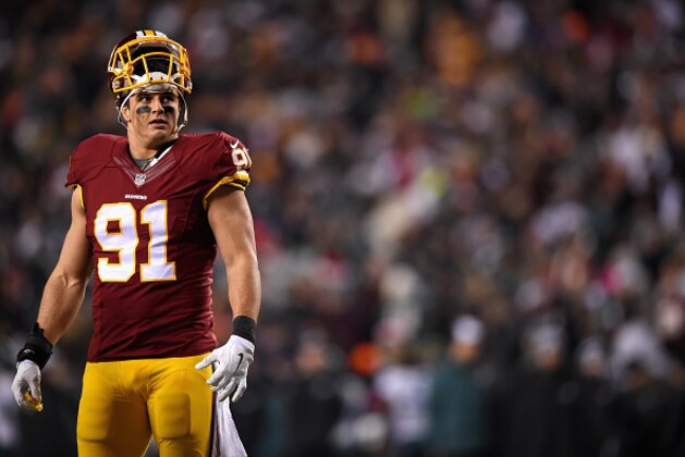 LANDOVER, MD - DECEMBER 20: Outside linebacker Ryan Kerrigan #91 of the Washington Redskins looks on during the first half of a game against the Philadelphia Eagles at FedExField on December 20, 2014 in Landover, Maryland.  (Photo by Patrick Smith/Getty Images)