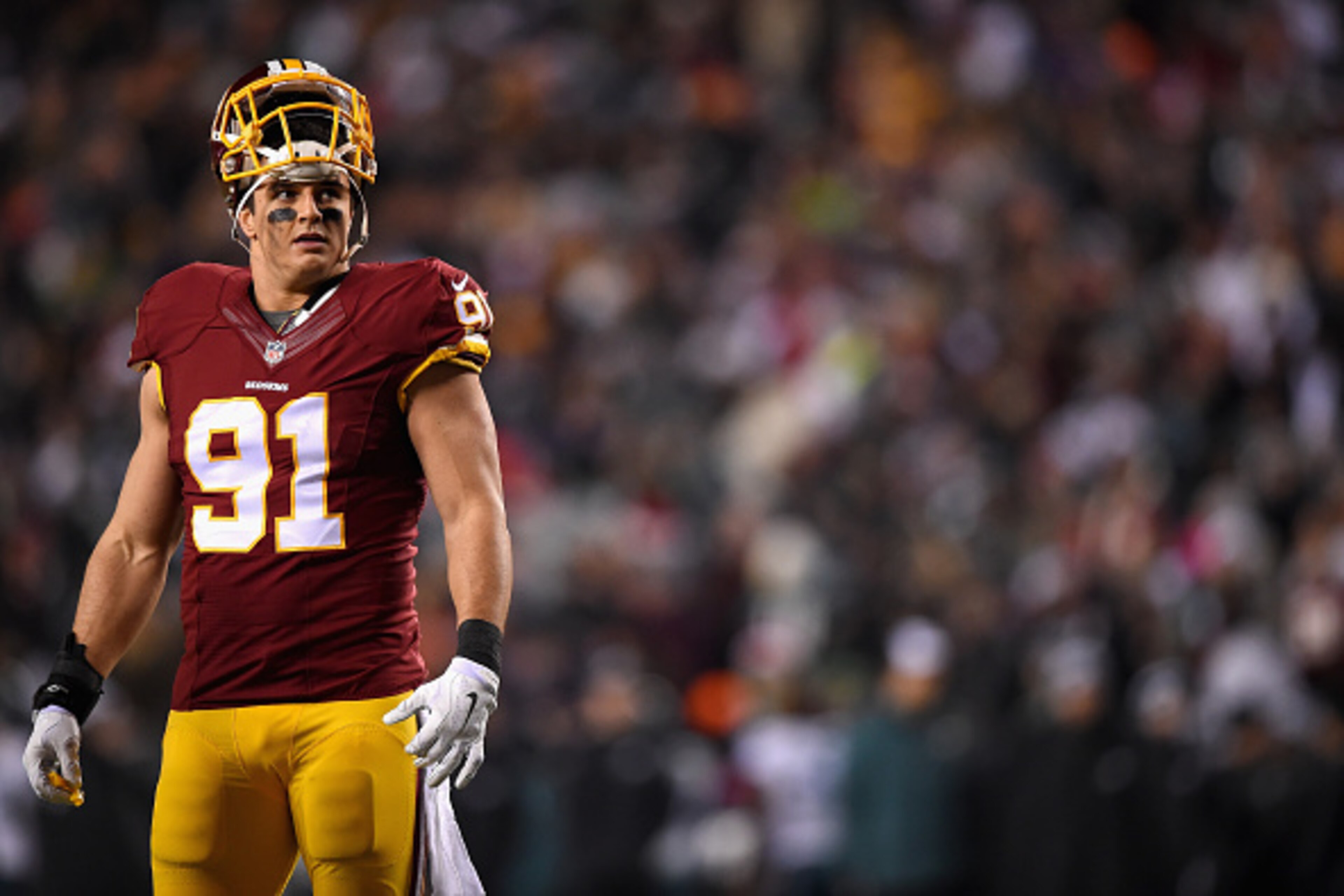 LANDOVER, MD - DECEMBER 20: Outside linebacker Ryan Kerrigan #91 of the Washington Redskins looks on during the first half of a game against the Philadelphia Eagles at FedExField on December 20, 2014 in Landover, Maryland.  (Photo by Patrick Smith/Getty Images)