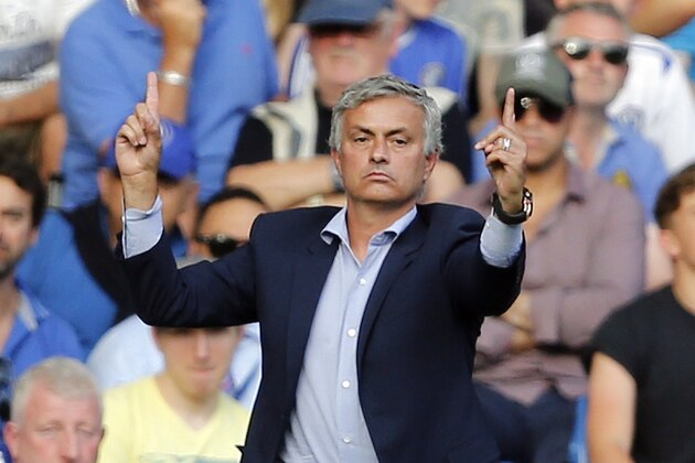 Chelsea's manager Jose Mourinho gestures during the English Premier League soccer match between Chelsea and Swansea City at Stamford Bridge stadium in London, Saturday, Aug. 8, 2015.(AP Photo/Frank Augstein)