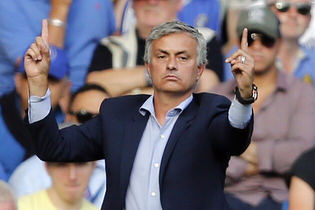 Chelsea's manager Jose Mourinho gestures during the English Premier League soccer match between Chelsea and Swansea City at Stamford Bridge stadium in London, Saturday, Aug. 8, 2015.(AP Photo/Frank Augstein)