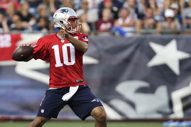 New England Patriots quarterback Jimmy Garoppolo (10) throws during an NFL football training camp in Foxborough, Mass., Wednesday, Aug. 5, 2015. (AP Photo/Charles Krupa)