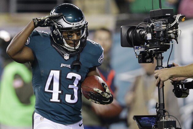 Philadelphia Eagles' Darren Sproles celebrates after scoring a touchdown during the first half of an NFL football game against the Carolina Panthers, Monday, Nov. 10, 2014, in Philadelphia. (AP Photo/Michael Perez)