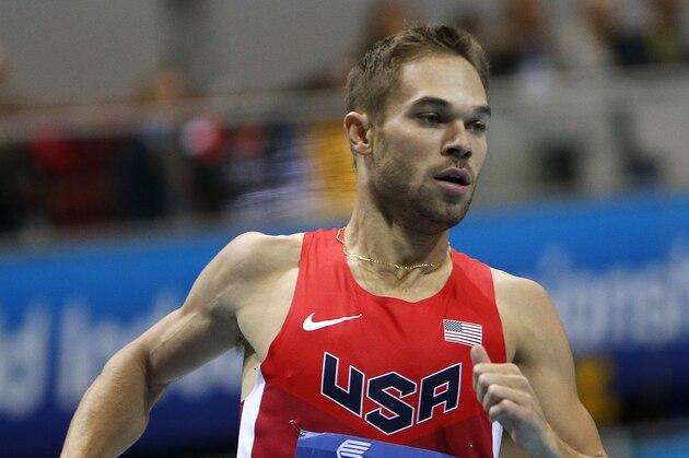 United States' Nick Symmonds runs in the men's 800m heat during the Athletics World Indoor Championships in Sopot, Poland, Friday, March 7, 2014. (AP Photo/Petr David Josek)