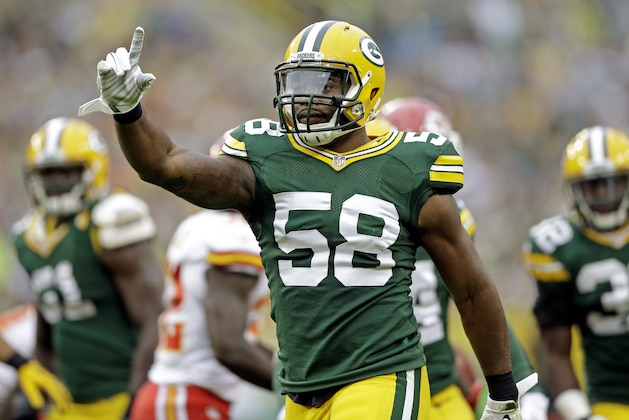 Green Bay Packers' Sam Barrington reacts after making a stop on special teams during the first half of an NFL football preseason game against the Kansas City Chiefs Thursday, Aug. 28, 2014, in Green Bay, Wis. (AP Photo/Tom Lynn)