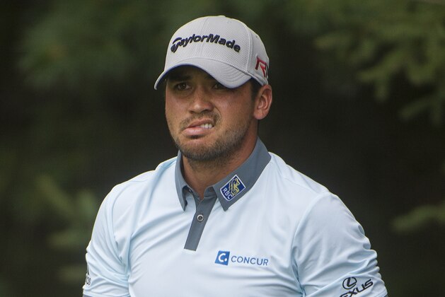 Jason Day watches his drive on the second hole during the third round of the Bridgestone Invitational golf tournament in Akron, Ohio, Saturday, Aug. 8, 2015. (AP Photo/Phil Long)