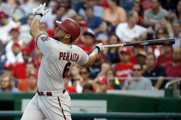 Arizona Diamondbacks' David Peralta (6) watches his two-run homer during the fourth inning of a baseball game against the Washington Nationals at Nationals Park, Monday, Aug. 3, 2015, in Washington. (AP Photo/Alex Brandon)