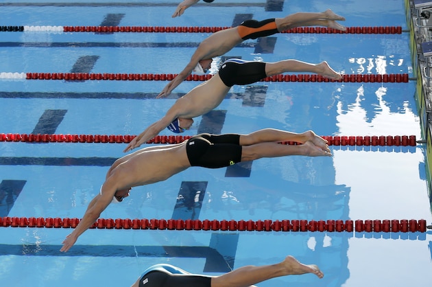 Michael Phelps, second from bottom, competes in the finals of the men's 200-meter breaststroke at the the U.S. swimming nationals, Monday, Aug. 10, 2015, in San Antonio. Phelps finished fifth. (AP Photo/Eric Gay)