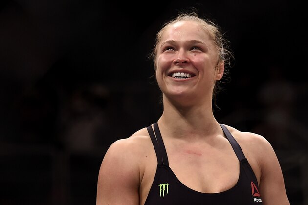 RIO DE JANEIRO, BRAZIL - AUGUST 01:  Ronda Rousey of the United States celebrates victory over Bethe Correia of Brazil in their bantamweight title fight during the UFC 190 Rousey v Correia at HSBC Arena on August 1, 2015 in Rio de Janeiro, Brazil.  (Photo by Buda Mendes/Zuffa LLC/Zuffa LLC via Getty Images)