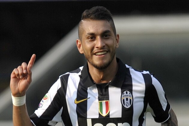 Juventus' Roberto Pereyra celebrates after scoring a goal during their Serie A soccer match against Verona, at Verona's Bentegodi stadium, Italy, Saturday, May 30, 2015. (AP Photo/Marco Vasini)
