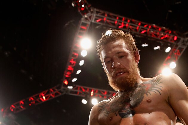 LAS VEGAS, NV - JULY 11:  Conor McGregor reacts to his victory over Chad Mendes in their UFC interim featherweight title fight during the UFC 189 event inside MGM Grand Garden Arena on July 11, 2015 in Las Vegas, Nevada.  (Photo by Christian Petersen/Zuffa LLC/Zuffa LLC via Getty Images)