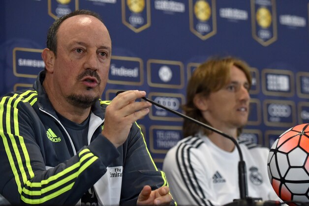 Real Madrid coach Rafa Benitez speaks next to Luca Modric (R) during a press conference after a team training session at the International Champions Cup football tournament in Melbourne on July 23, 2015. AFP PHOTO / Paul CROCK -- IMAGE RESTRICTED TO EDITORIAL USE - STRICTLY NO COMMERCIAL USE        (Photo credit should read PAUL CROCK/AFP/Getty Images)