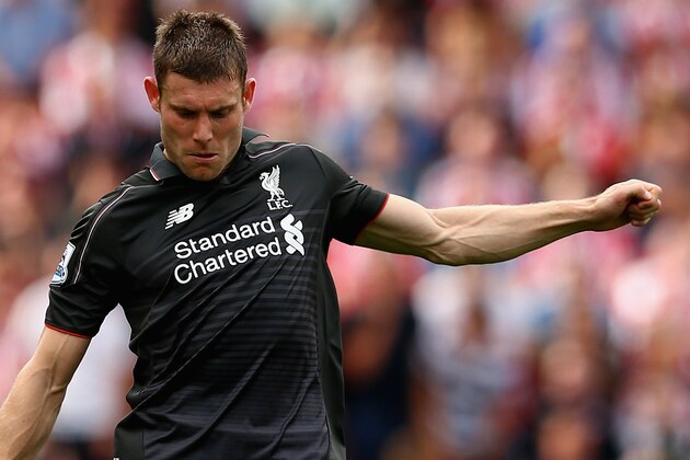 STOKE ON TRENT, ENGLAND - AUGUST 09:  James Milner of Liverpool in action during the Barclays Premier League match between Stoke City and Liverpool at Britannia Stadium on August 9, 2015 in Stoke on Trent, England.  (Photo by Clive Brunskill/Getty Images)