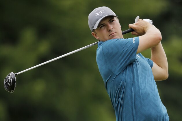 Jordan Spieth tees off on the eighth hole during the final round of the Bridgestone Invitational golf tournament at Firestone Country Club, Sunday, Aug. 9, 2015, in Akron, Ohio. (AP Photo/Tony Dejak)