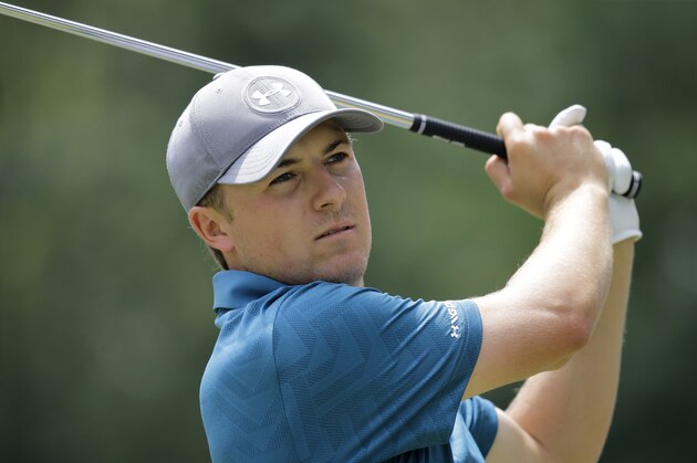 Jordan Spieth tees off on the seventh hole during the final round of the Bridgestone Invitational golf tournament at Firestone Country Club, Sunday, Aug. 9, 2015, in Akron, Ohio. (AP Photo/Tony Dejak)