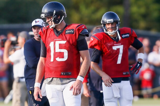 Houston Texans quarterback Ryan Mallett (15) and quarterback Brian Hoyer (7) during an NFL football training camp at the Methodist Training Center on Monday August 3, 2015 in Houston. (AP Photo/Bob Levey)