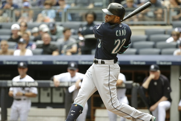 Seattle Mariners' Robinson Cano hits a two run home run during the first inning of a baseball game against the New York Yankees Saturday, July 18, 2015, in New York. (AP Photo/Frank Franklin II)
