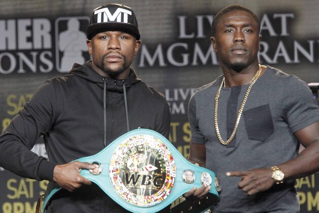 Floyd Mayweather Jr., left, and Andre Berto pose at a news conference in Los Angeles on Thursday, Aug. 6, 2015. Mayweather says Berto is a worthy opponent for the final fight of his perfect career. (AP Photo/Nick Ut) Floyd Mayweather Jr., left, and Andre Berto pose at a news conference in Los Angeles on Thursday, Aug. 6, 2015. Mayweather says Berto is a worthy opponent for the final fight of his perfect career. (AP Photo/Nick Ut)