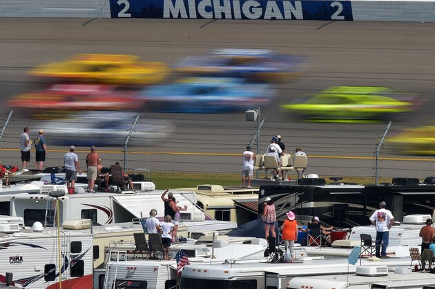 BROOKLYN, MI - JUNE 14:  Cars race during the NASCAR Sprint Cup Series Quicken Loans 400 at Michigan International Speedway on June 14, 2015 in Brooklyn, Michigan.  (Photo by Drew Hallowell/Getty Images)