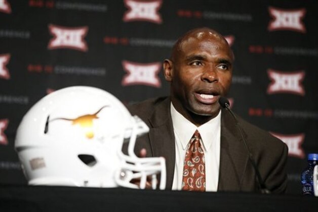 Texas head football coach Charlie Strong responds to questions during the Big 12 Conference Football Media Days Tuesday, July 21, 2015, in Dallas. (AP Photo/Tony Gutierrez)