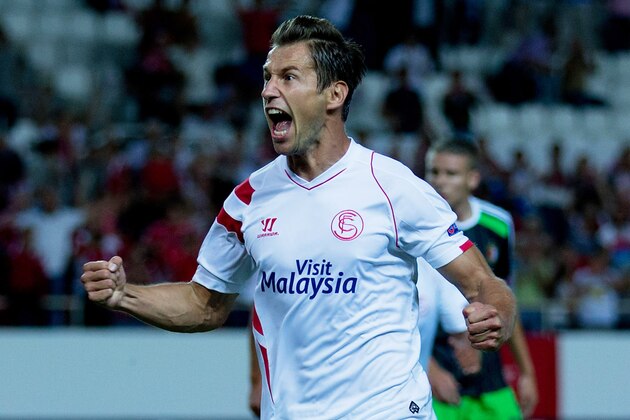 SEVILLE, SPAIN - SEPTEMBER 18:  Grzegorz Krychowiak of Sevilla FC celebrates scoring their opening goal during the UEFA Europa League group G match between Sevilla FC and Feyenoord at Ramon Sanchez Pizjuan stadium on September 18, 2014 in Seville, Spain.  (Photo by Gonzalo Arroyo Moreno/Getty Images)