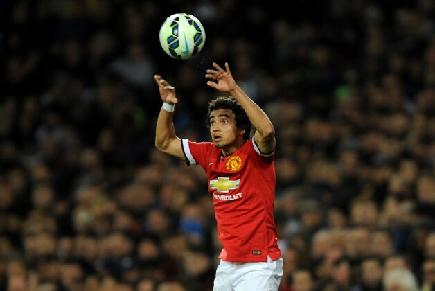 Manchester United's Rafael during the English Premier League soccer match between West Bromwich Albion and Manchester United at the Hawthorns, Birmingham, England, Monday, Oct. 20, 2014. (AP Photo/Rui Vieira)