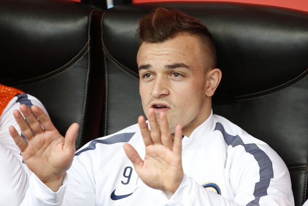 Inter Milan's Xherdan Shaqiri gestures prior to the start of the Serie A soccer match between Inter Milan and Genoa at the San Siro stadium in Milan, Italy, Sunday, Jan. 11, 2015. (AP Photo/Antonio Calanni)