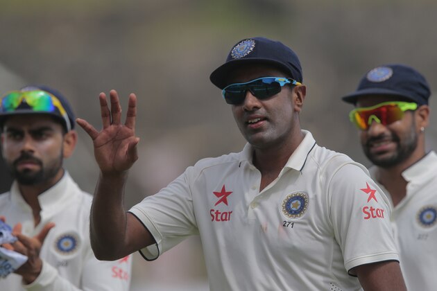 India's bowler Ravichandran Ashwin acknowledges after taking five Sri Lankan wickets during the first cricket test match between India and Sri Lanka in Galle, Sri Lanka, Wednesday, Aug. 12, 2015. (AP Photo/Eranga Jayawardena)