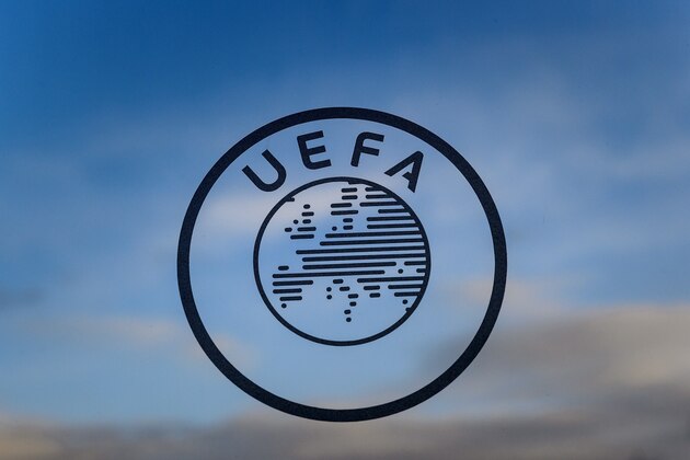 A logo of the UEFA the European football governing body is seen on December 15, 2014 at the UEFA headquarters in Nyon. AFP PHOTO / FABRICE COFFRINI        (Photo credit should read FABRICE COFFRINI/AFP/Getty Images)