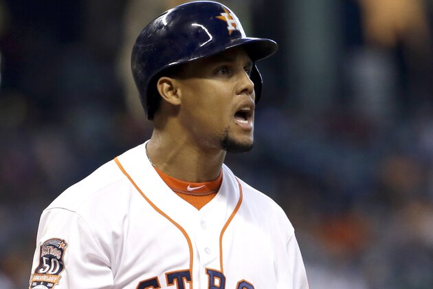 Houston Astros' Carlos Gomez reacts after striking out against the Arizona Diamondbacks during the first inning of a baseball game, Sunday, Aug. 2, 2015, in Houston. (AP Photo/David J. Phillip)