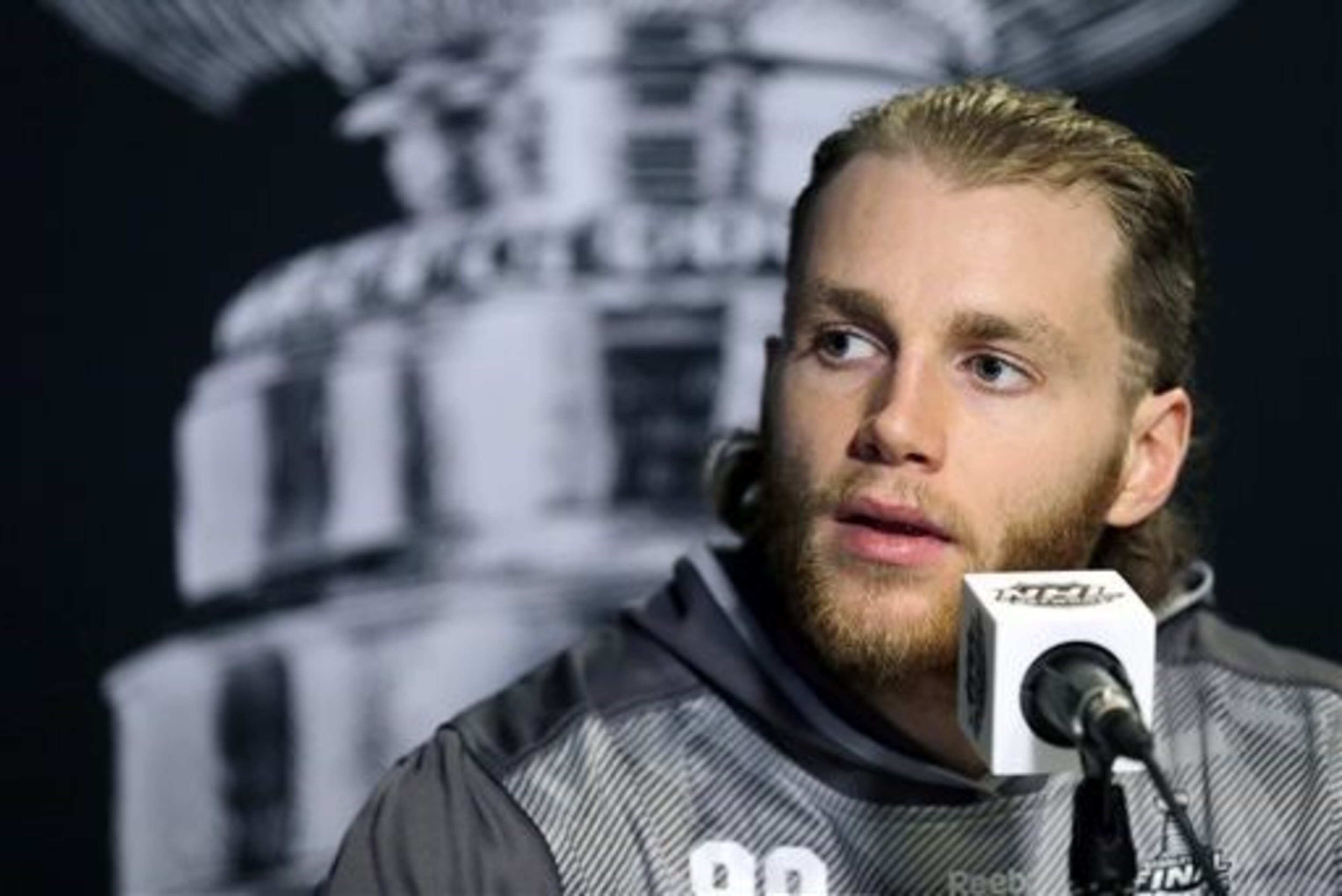 FILE - In this June 2, 2015, file photo, Chicago Blackhawks right wing Patrick Kane answers a question during media day for NHL hockey's Stanley Cup finals in Tampa, Fla. The police investigation of Blackhawks star Patrick Kane concerns something that happened between the player and a woman in her 20s, the AP is told. Police have said only that the inquiry involves an FILE - In this June 2, 2015, file photo, Chicago Blackhawks right wing Patrick Kane answers a question during media day for NHL hockey's Stanley Cup finals in Tampa, Fla. The police investigation of Blackhawks star Patrick Kane concerns something that happened between the player and a woman in her 20s, the AP is told. Police have said only that the inquiry involves an
