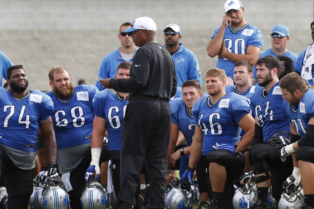 Detroit Lions head coach Jim Caldwell talks to the team after NFL football training camp in Allen Park, Mich., Friday, Aug. 7, 2015. (AP Photo/Paul Sancya)