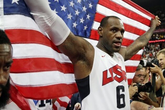 United States' LeBron James celebrates after the men's gold medal basketball game at the 2012 Summer Olympics, Sunday, Aug. 12, 2012, in London. USA won 107-100. (AP Photo/Eric Gay)