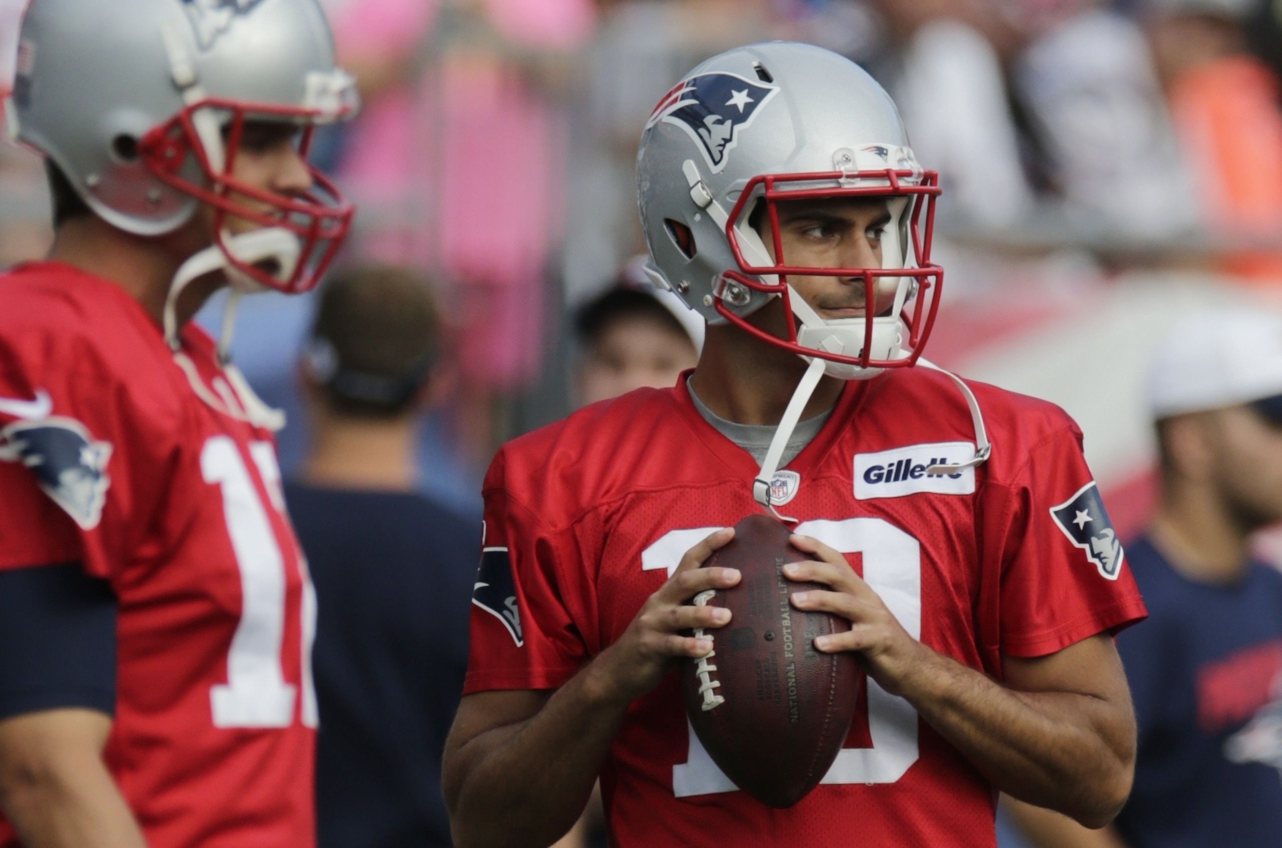 New England Patriots quarterback Jimmy Garoppolo (10) warms up during an NFL football training camp in Foxborough, Mass., Wednesday, Aug. 5, 2015. (AP Photo/Charles Krupa)