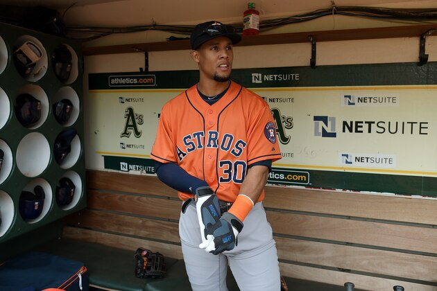 OAKLAND, CA - AUGUST 08:  Carlos Gomez #30 of the Houston Astros looks on from the dugout prior to the start of the game against the Oakland Athletics at O.co Coliseum on August 8, 2015 in Oakland, California.  (Photo by Thearon W. Henderson/Getty Images)